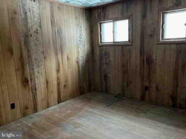 471 Griffith Road Tyler Hill, PA 18469 - Photo 9 of 11 a view of a bathroom with a window and a wooden door