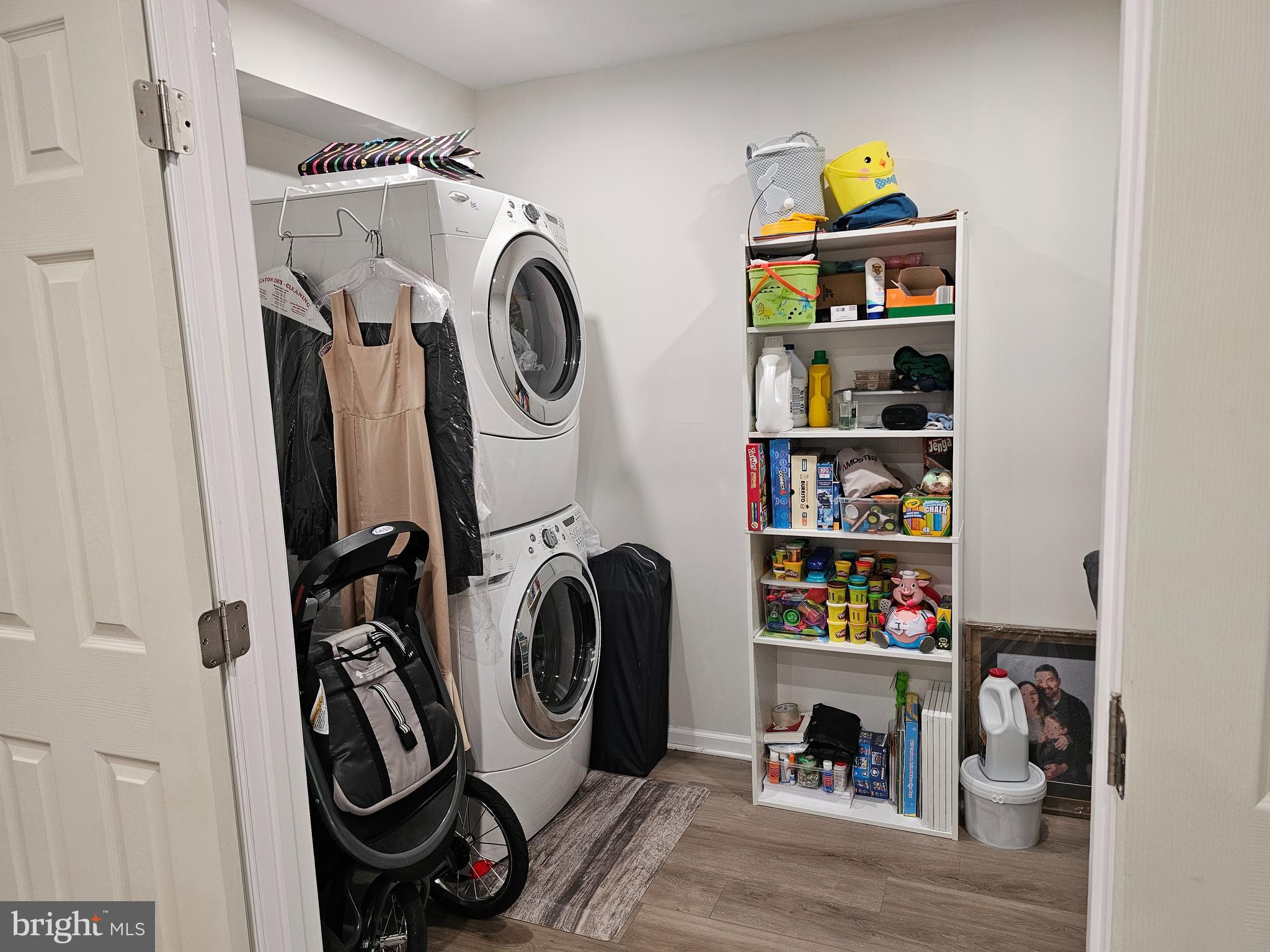 120 Eagles Ridge Smithsburg, MD 21783 - Photo 14 of 22 a utility room with dryer washer and a view of living room