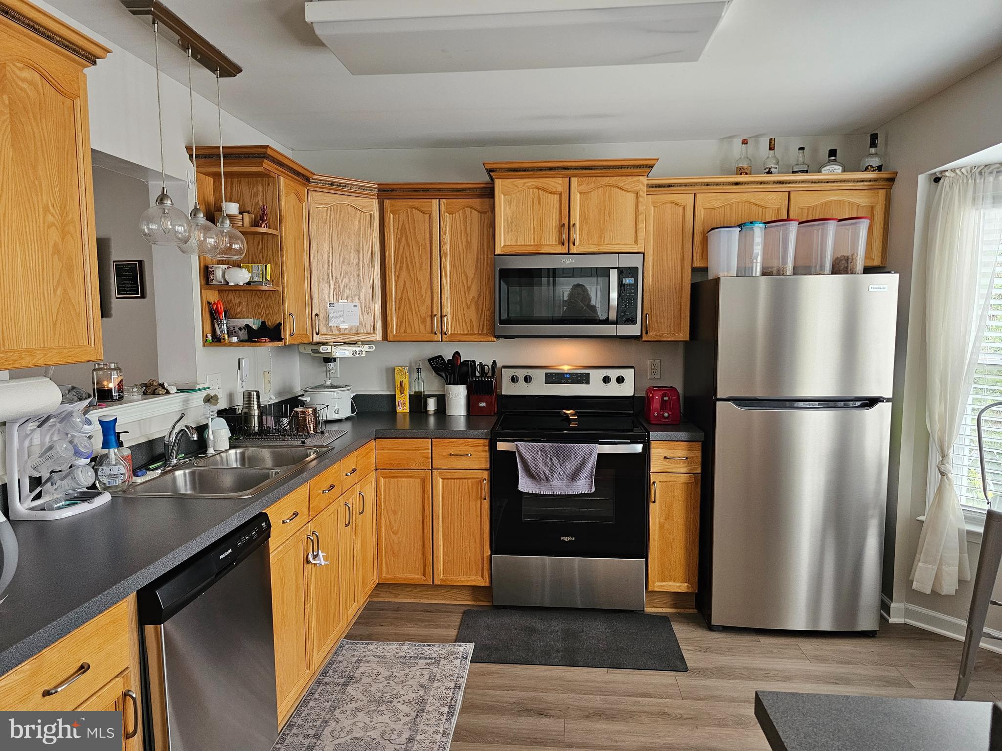 120 Eagles Ridge Smithsburg, MD 21783 - Photo 4 of 22 a kitchen with a refrigerator stove and sink