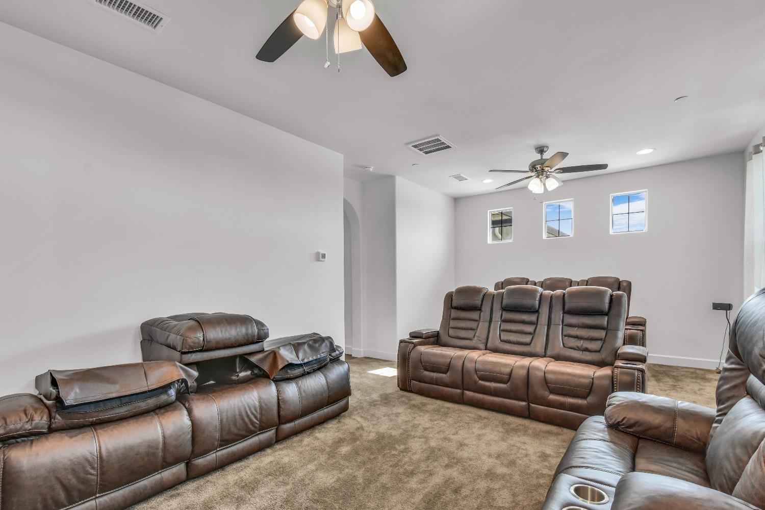 400 Ridge Creek Estates Way Dinuba, CA 93618 - Photo 25 of 49 a living room with furniture