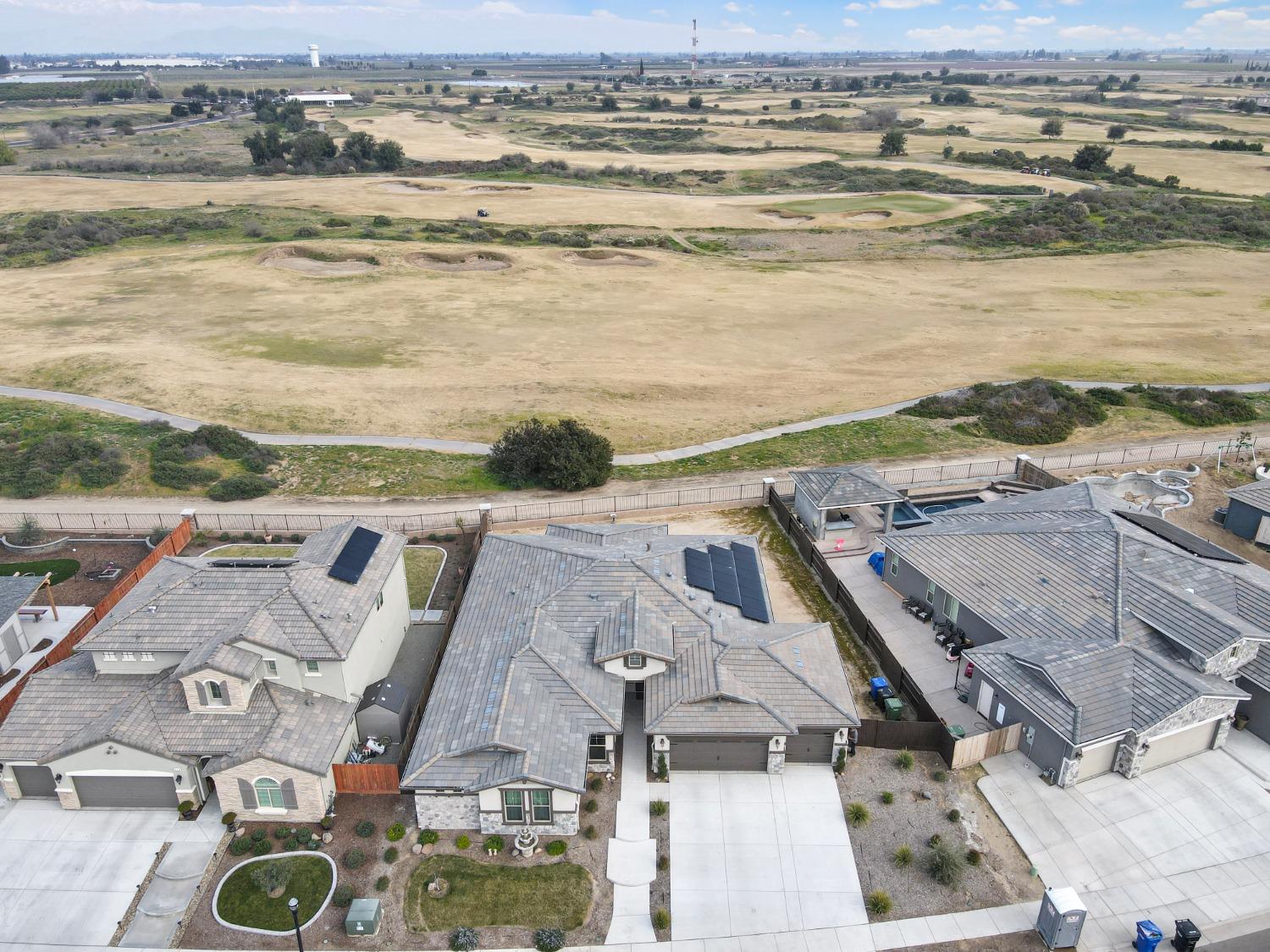 400 Ridge Creek Estates Way Dinuba, CA 93618 - Photo 45 of 49 an aerial view of residential building with ocean view