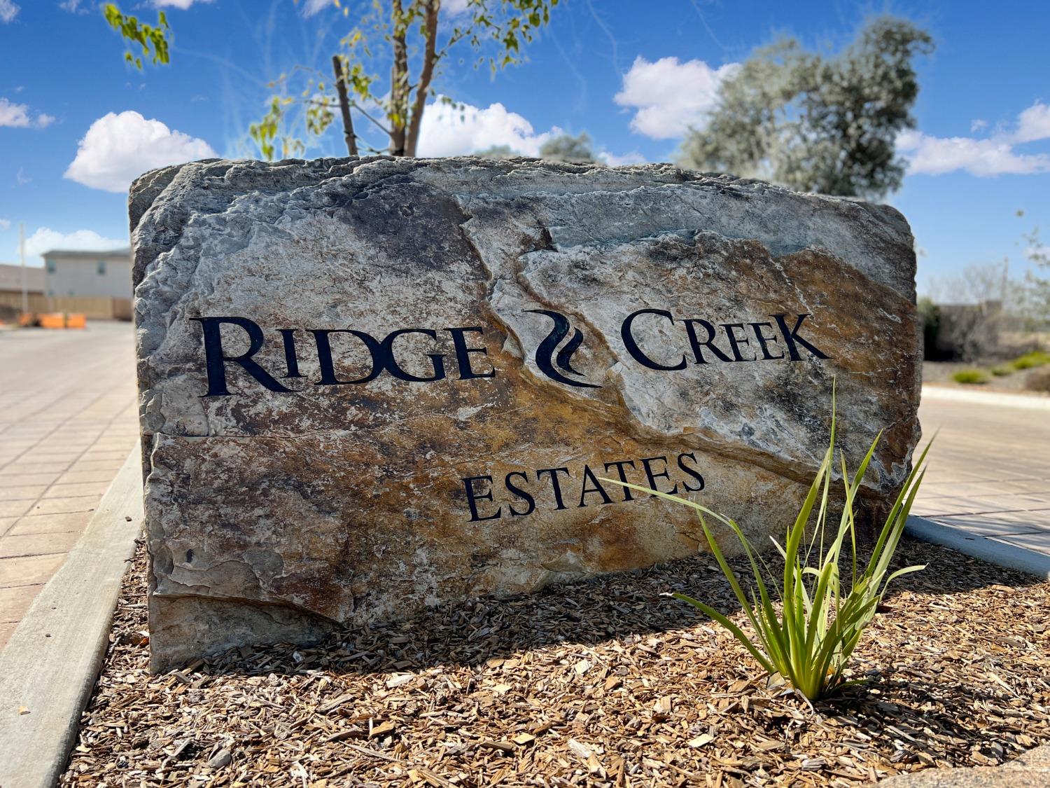 400 Ridge Creek Estates Way Dinuba, CA 93618 - Photo 49 of 49 a view of a sign board