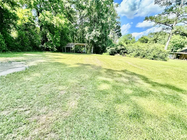 a view of an outdoor space and a yard