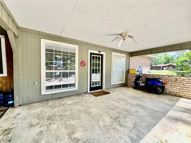 a view of a livingroom with furniture and window