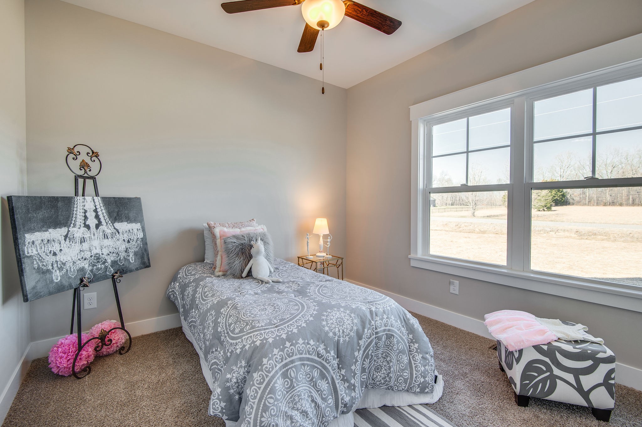 1026 Hayshed Road Dickson, TN 37055 - Photo 14 of 30 a bedroom with a bed and chandelier