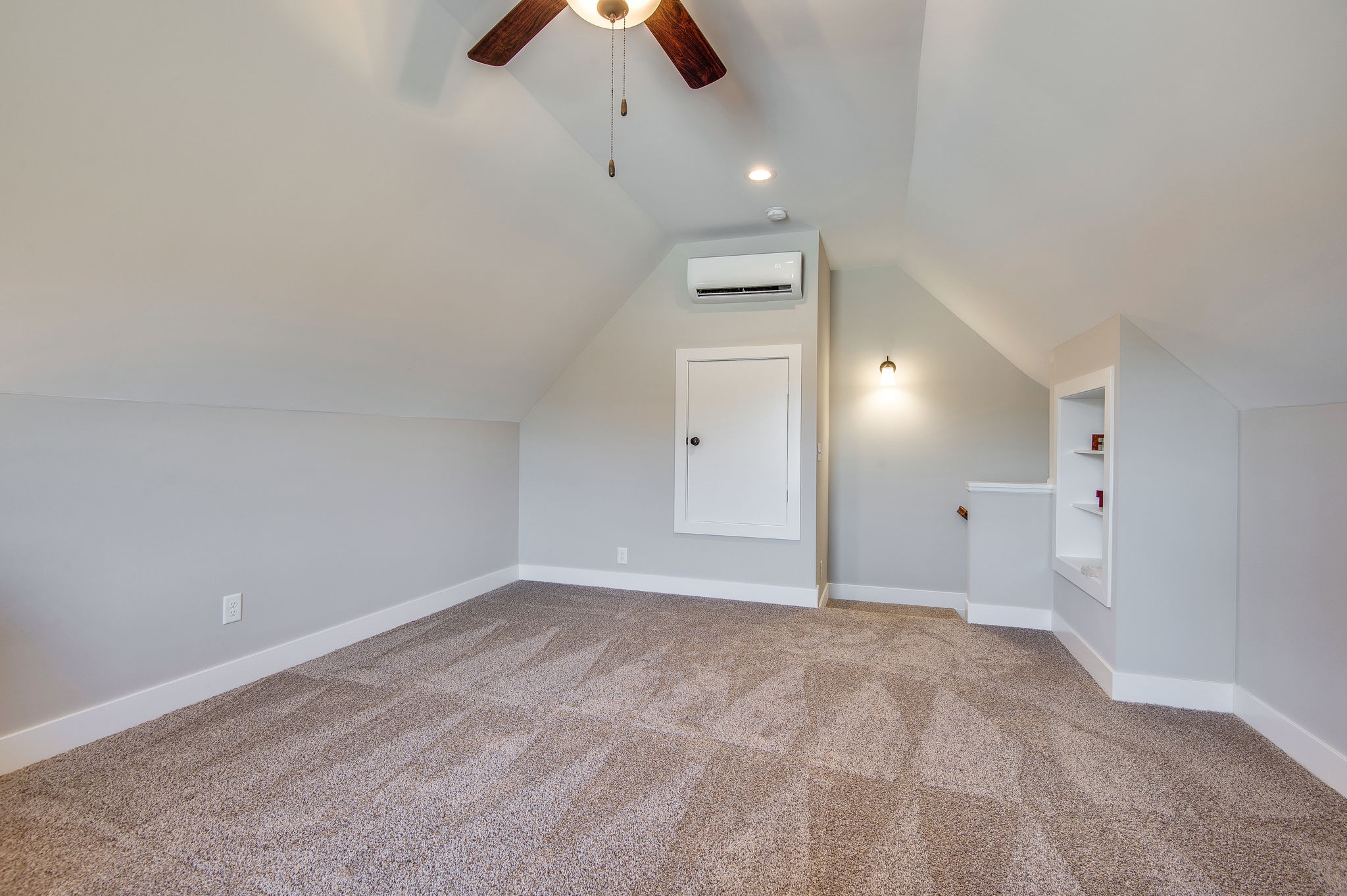 1026 Hayshed Road Dickson, TN 37055 - Photo 18 of 30 an empty room with chandelier fan and windows