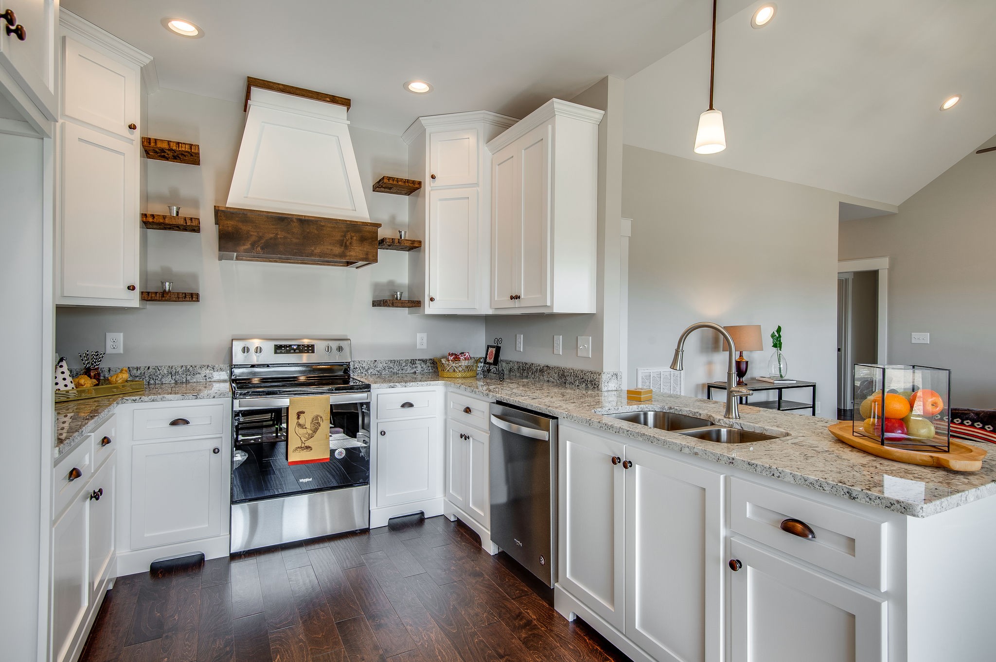 1026 Hayshed Road Dickson, TN 37055 - Photo 3 of 30 a kitchen with stainless steel appliances granite countertop a sink stove and refrigerator