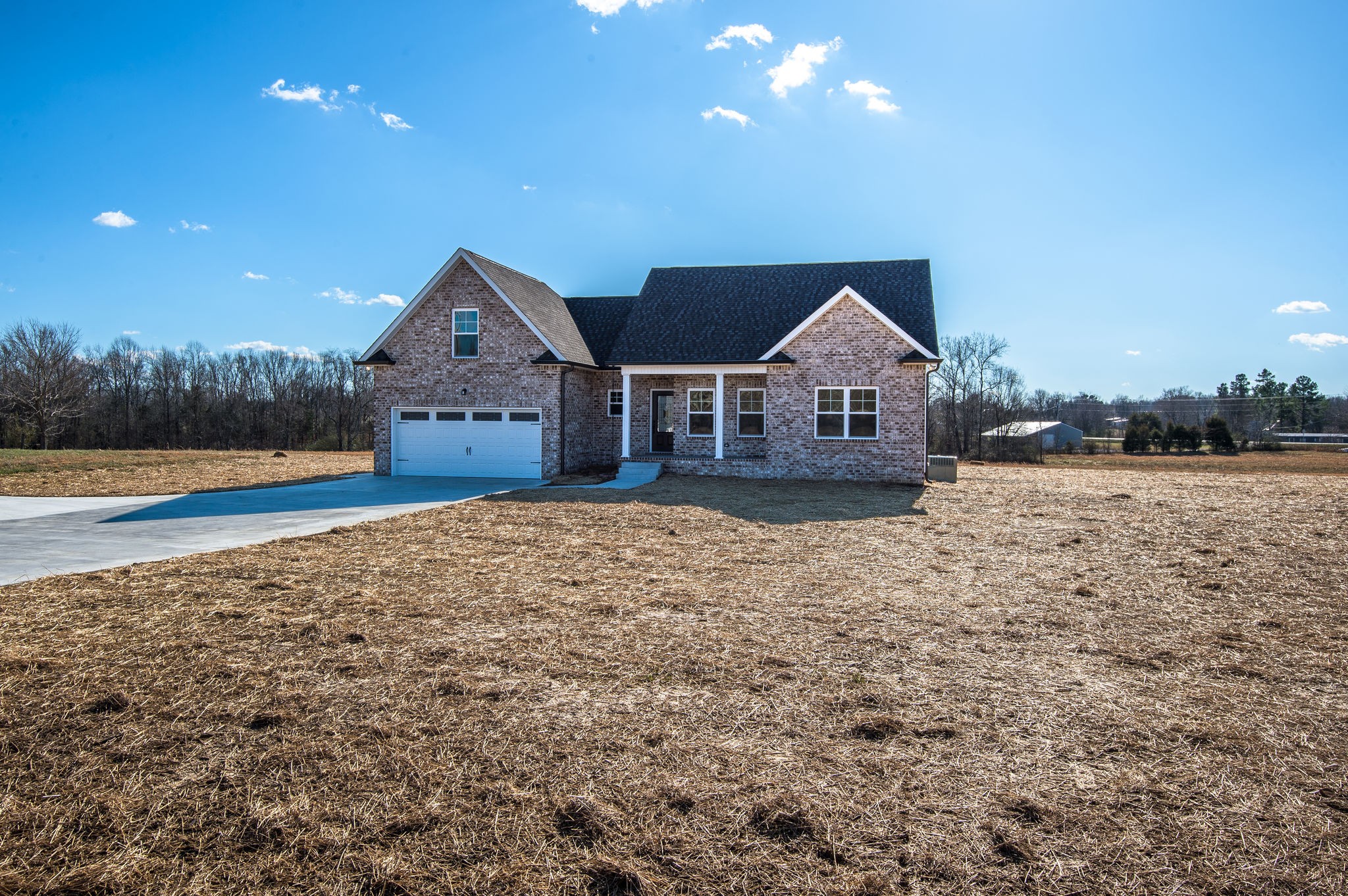 1026 Hayshed Road Dickson, TN 37055 - Photo 24 of 30 a front view of a house with a yard