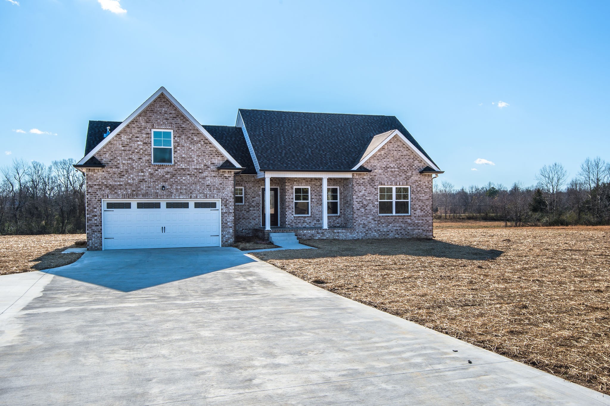 1026 Hayshed Road Dickson, TN 37055 - Photo 25 of 30 a front view of house with yard and trees in the background