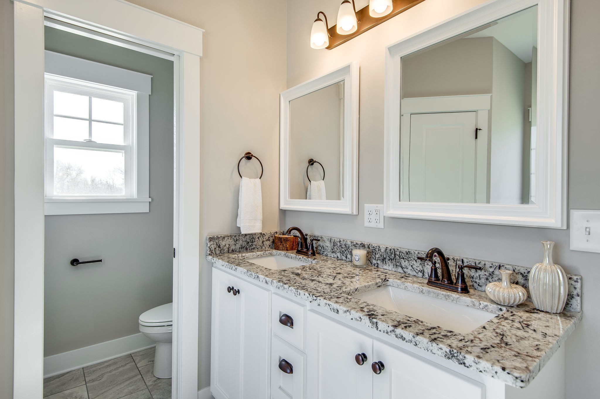 1026 Hayshed Road Dickson, TN 37055 - Photo 9 of 30 a bathroom with a granite countertop sink and a mirror