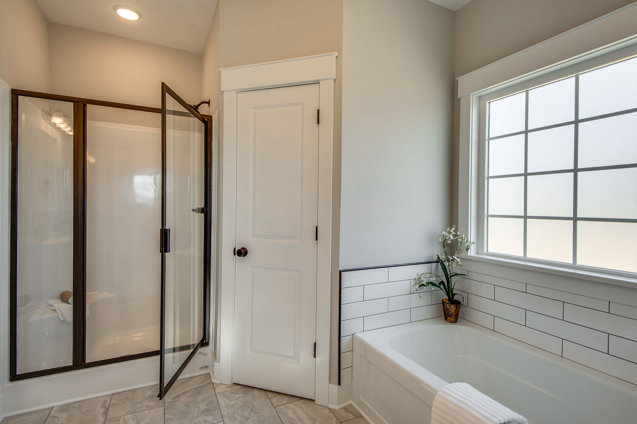 1026 Hayshed Road Dickson, TN 37055 - Photo 10 of 30 a bathroom with a bathtub and a shower