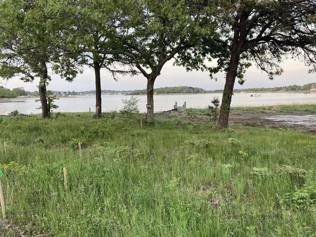 14 Over Jordan Road Wareham, MA 02571 - Photo 3 of 7 a view of an ocean with a tree