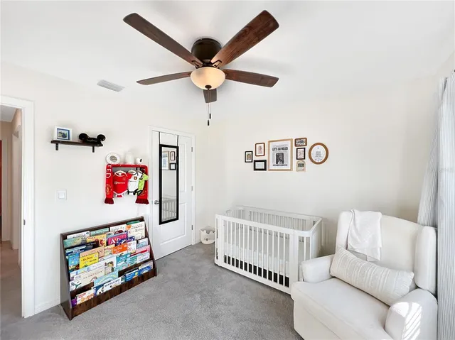 a bedroom with furniture and a bed