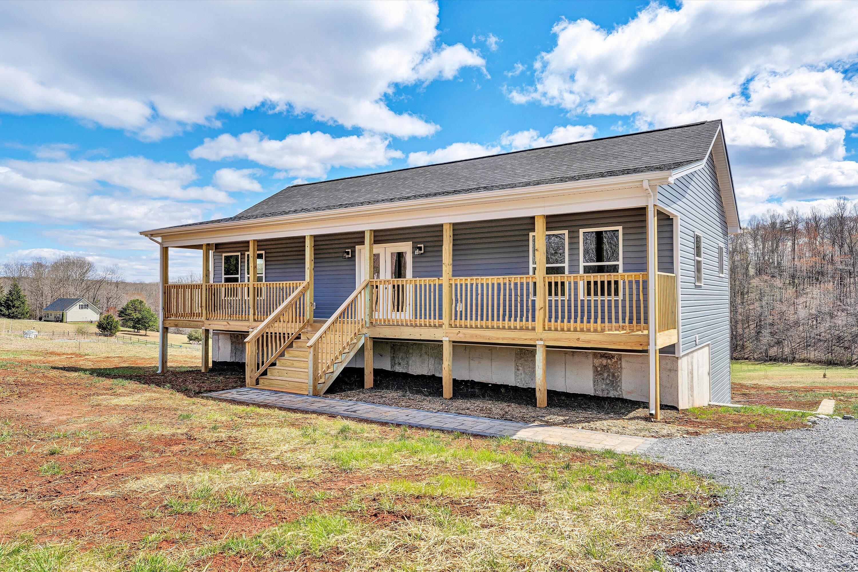 688 Wysong Ml Road Hardy, VA 24101 - Photo 2 of 42 a view of a house with a yard and sitting area