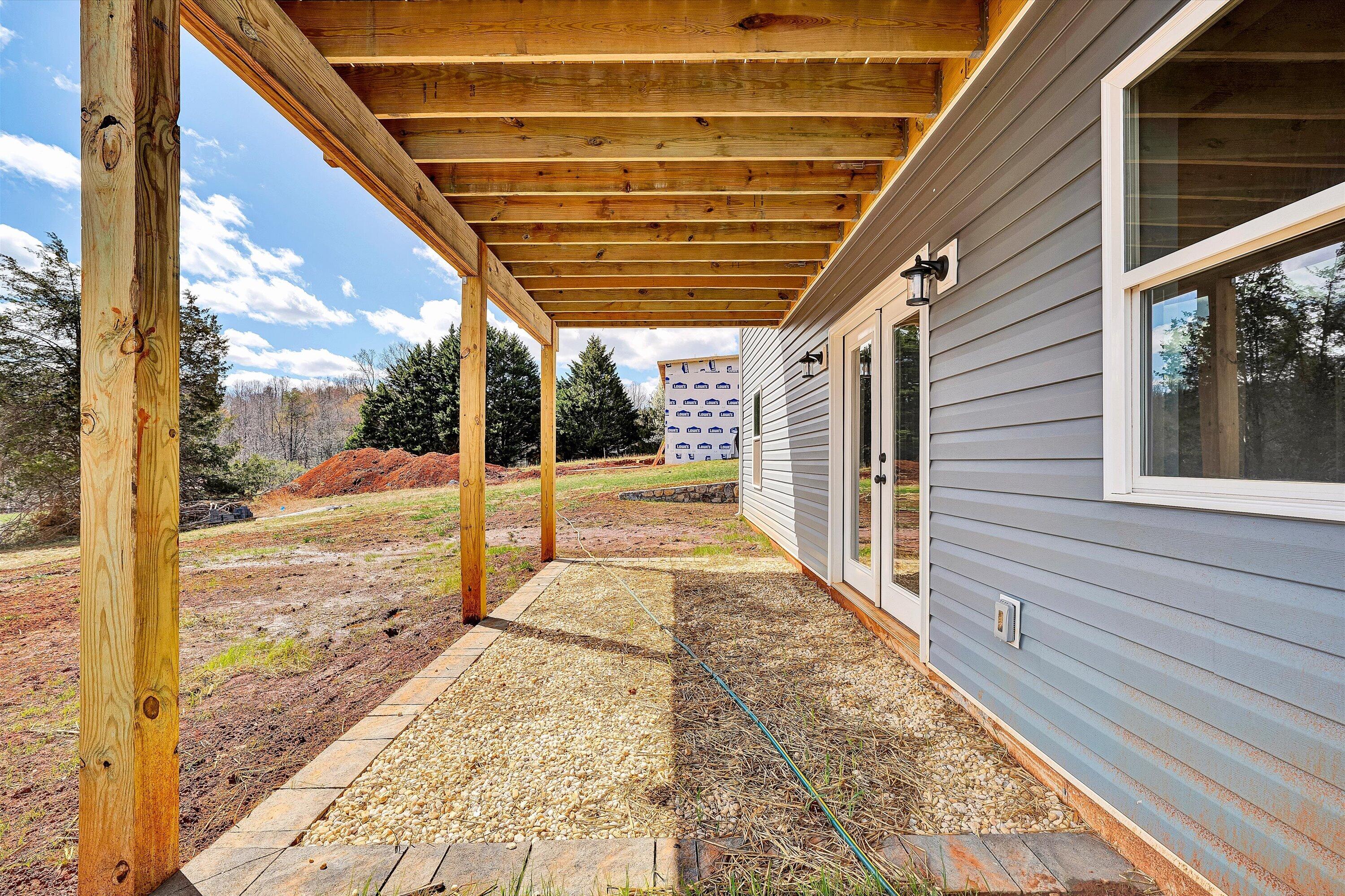 688 Wysong Ml Road Hardy, VA 24101 - Photo 31 of 42 a view of a porch with a bench