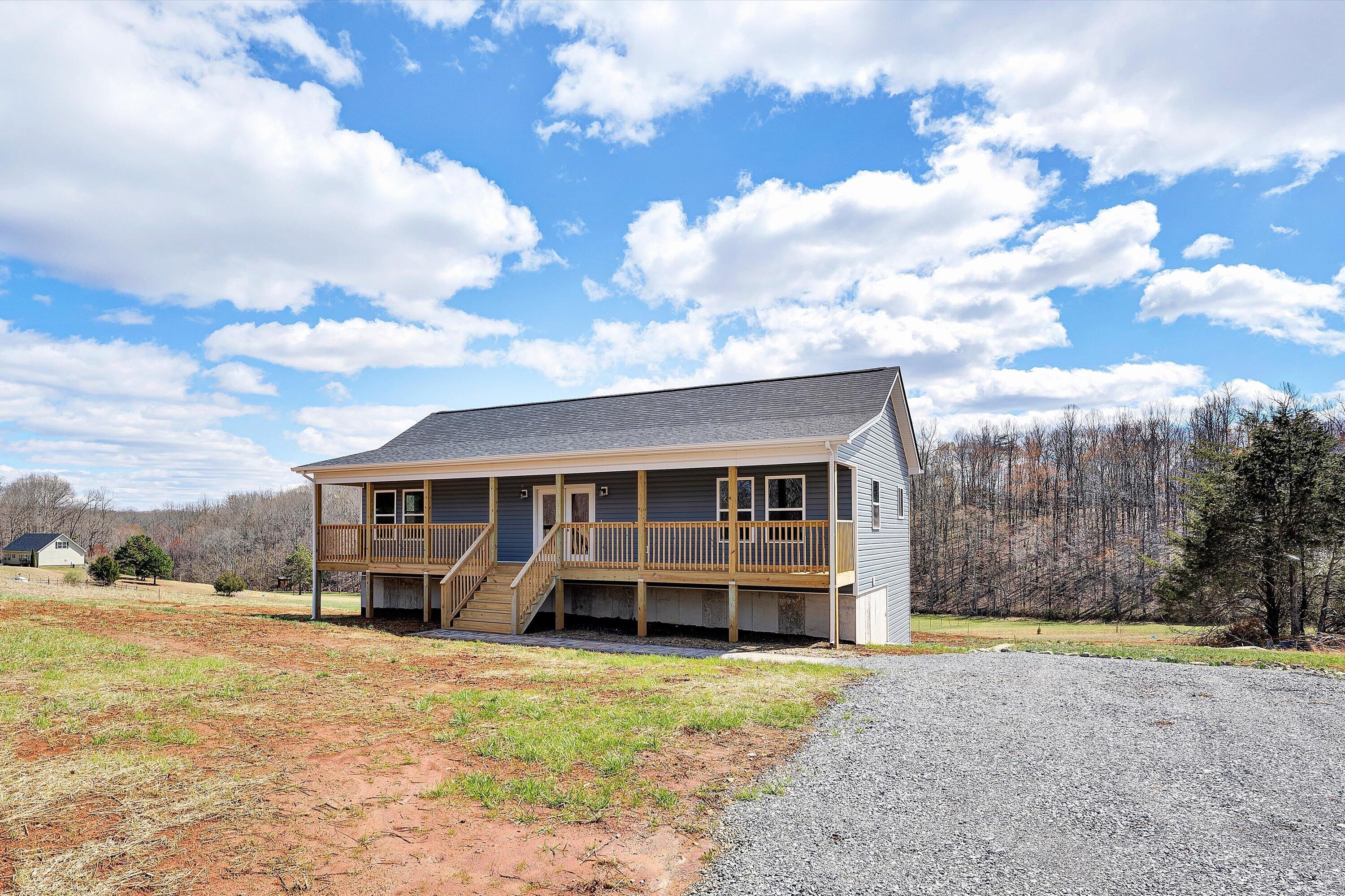 688 Wysong Ml Road Hardy, VA 24101 - Photo 33 of 42 a view of a house with backyard and porch