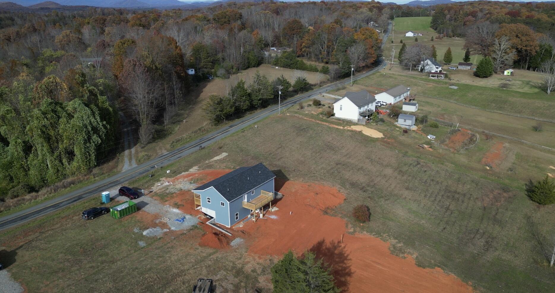688 Wysong Ml Road Hardy, VA 24101 - Photo 39 of 42 an aerial view of a house with a yard
