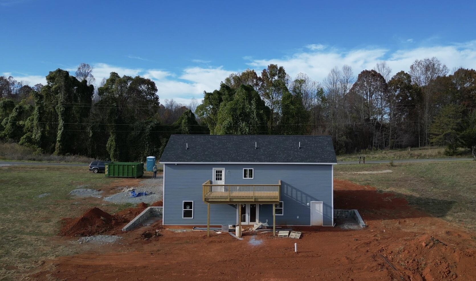 688 Wysong Ml Road Hardy, VA 24101 - Photo 40 of 42 a front view of a house with a yard