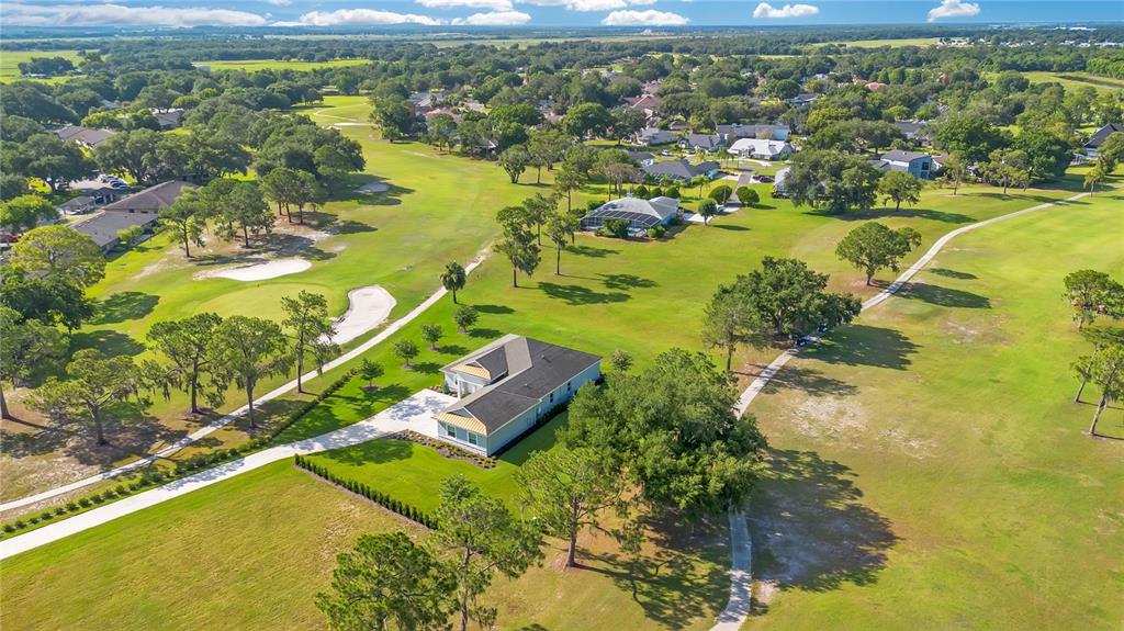 440 Palma Ceia Road Winter Haven, FL 33884 - Photo 68 of 78 a view of a lake with a houses