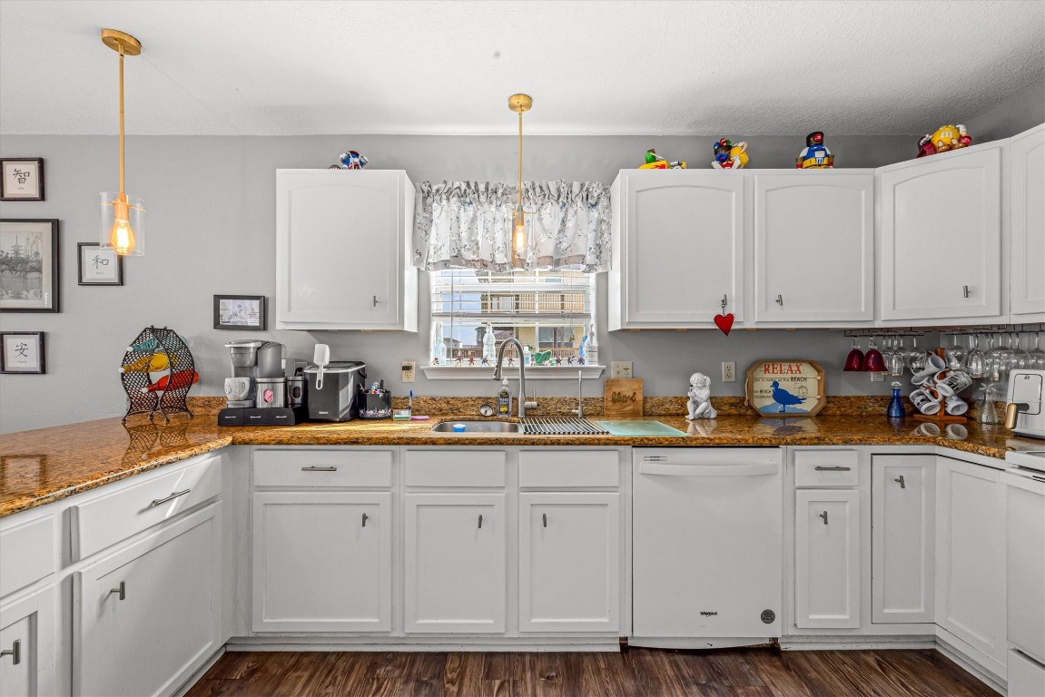 601 Wave Court Surfside Beach, TX 77541 - Photo 25 of 47 Spacious Kitchen full of cabinets