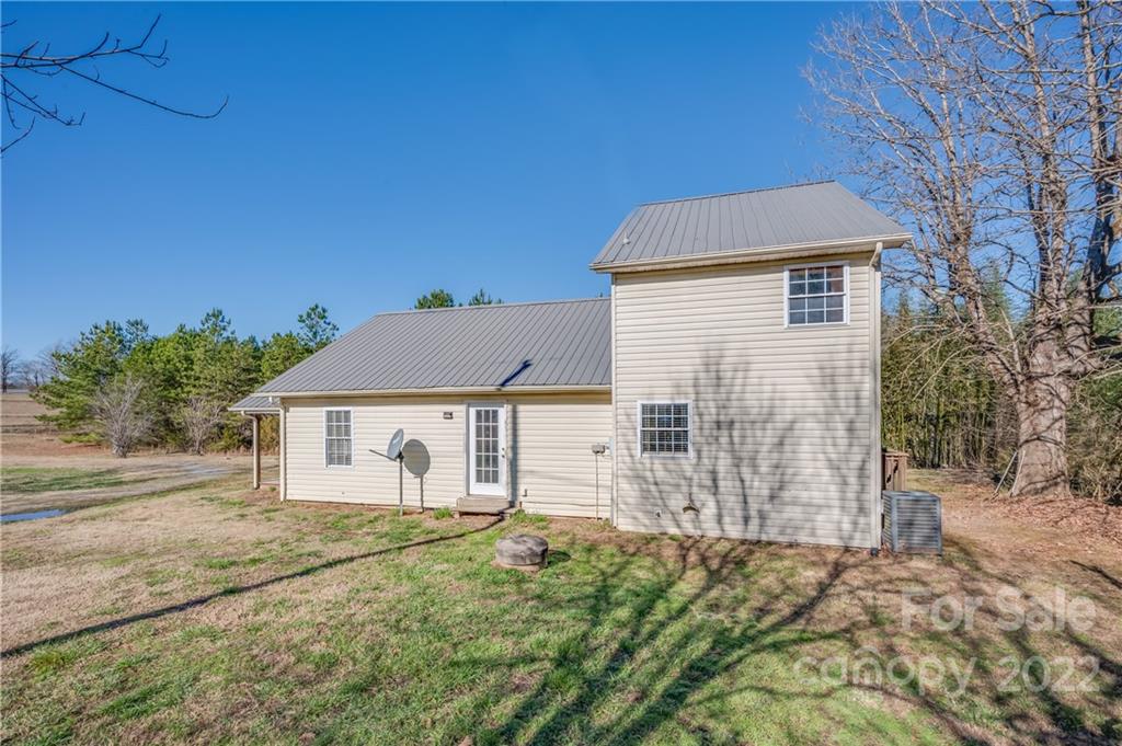 1591 Jack McKinney Road Rutherfordton, NC 28139 - Photo 3 of 34 a view of a house with a yard
