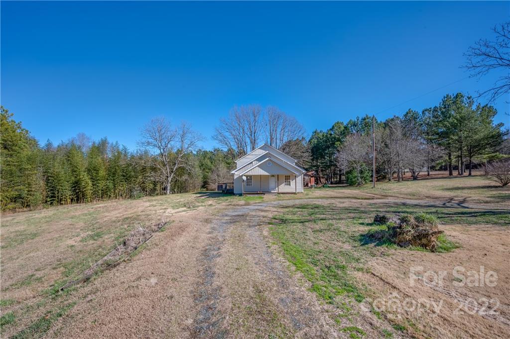 1591 Jack McKinney Road Rutherfordton, NC 28139 - Photo 34 of 34 a view of a dirt road with trees in the background