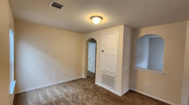 a bathroom with a double vanity sink and mirror