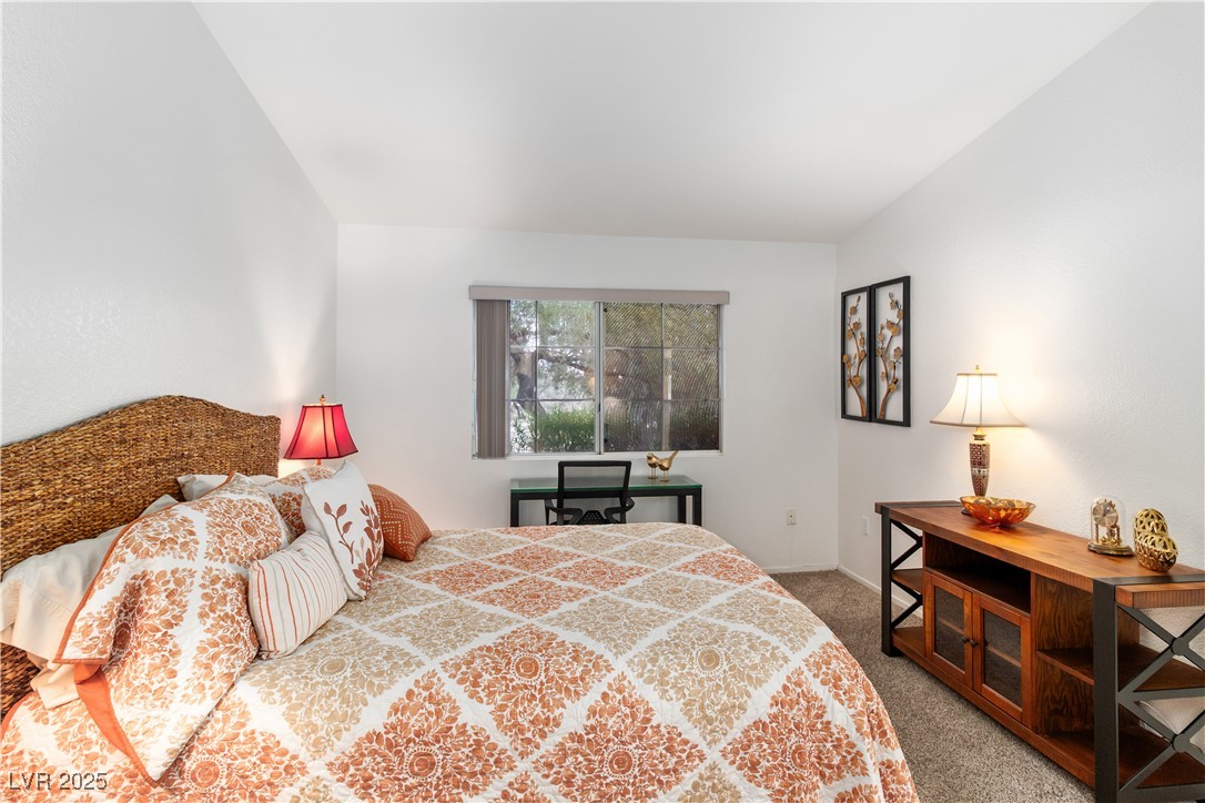 2297 Camel Mesa Drive Laughlin, NV 89029 - Photo 21 of 98 Carpeted Primary bedroom featuring baseboards