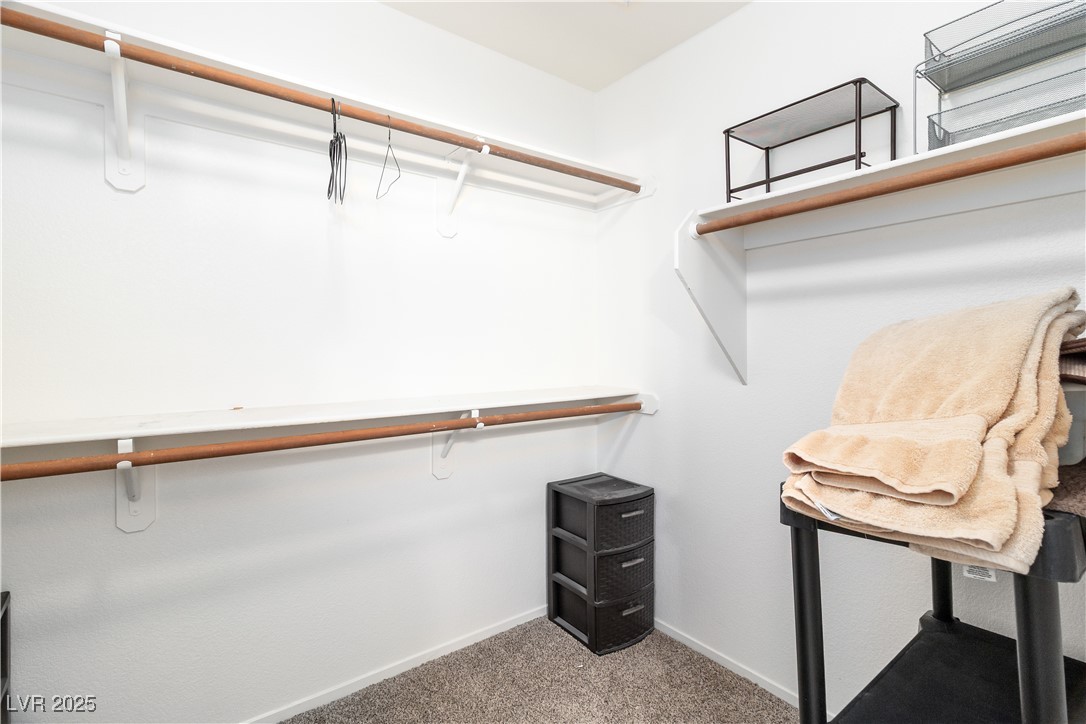 2297 Camel Mesa Drive Laughlin, NV 89029 - Photo 28 of 98 Spacious walk-in closet in Primary featuring light carpet
