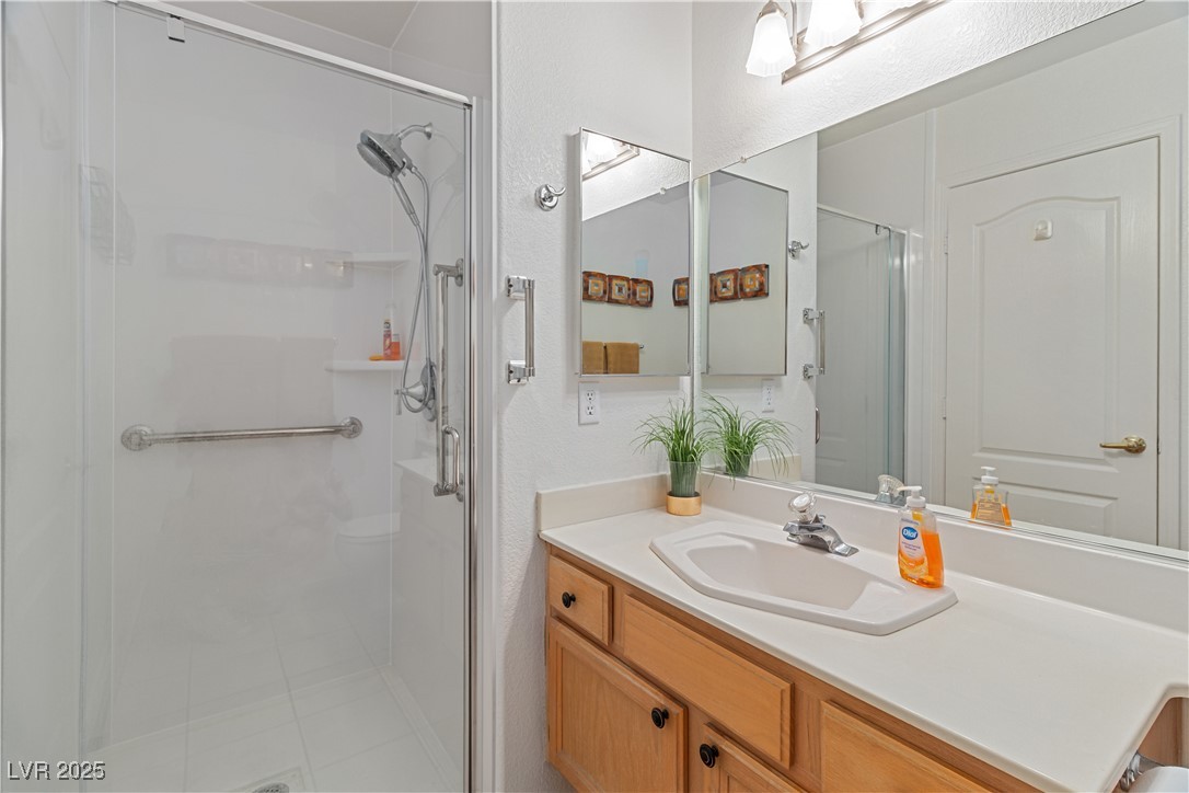 2297 Camel Mesa Drive Laughlin, NV 89029 - Photo 45 of 98 Full bathroom with a shower stall and vanity