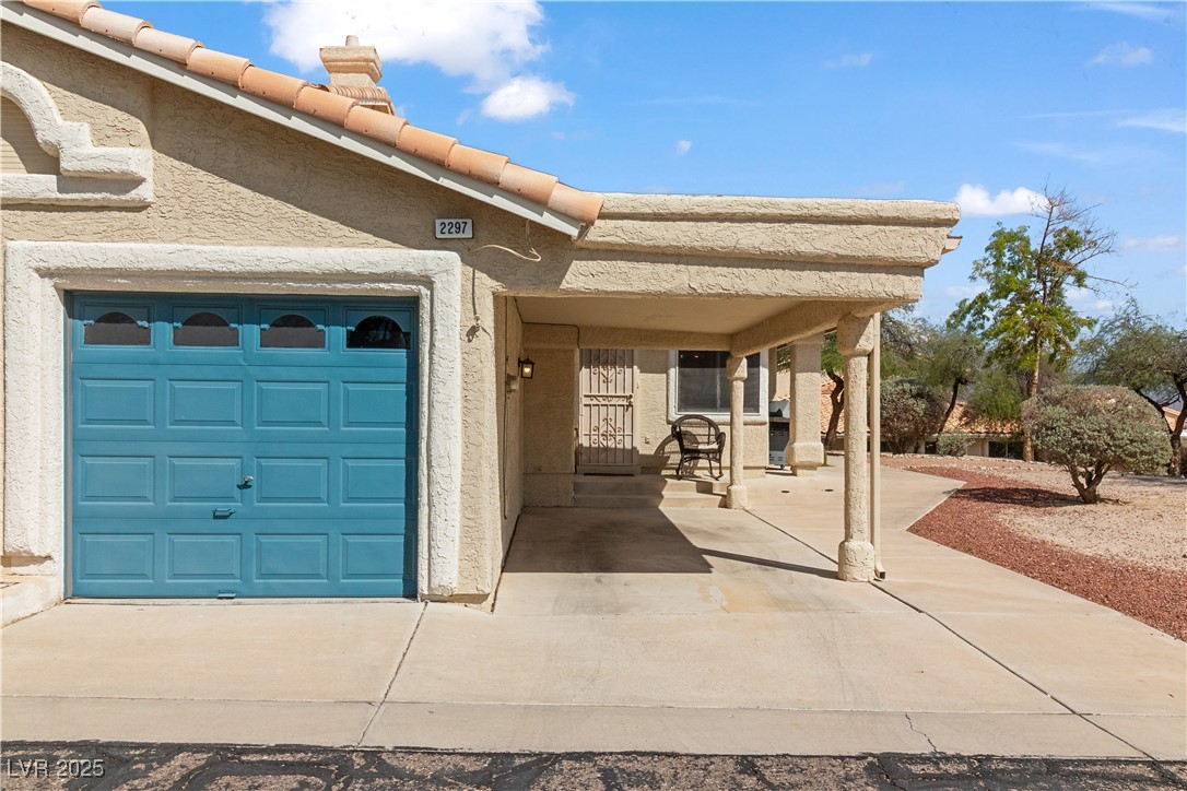 2297 Camel Mesa Drive Laughlin, NV 89029 - Photo 48 of 98 View of front exterior with garage and covered carport
