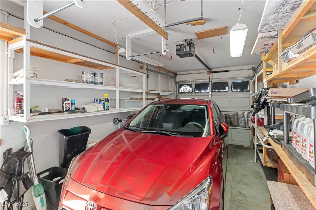 2297 Camel Mesa Drive Laughlin, NV 89029 - Photo 54 of 98 Garage featuring a garage door opener