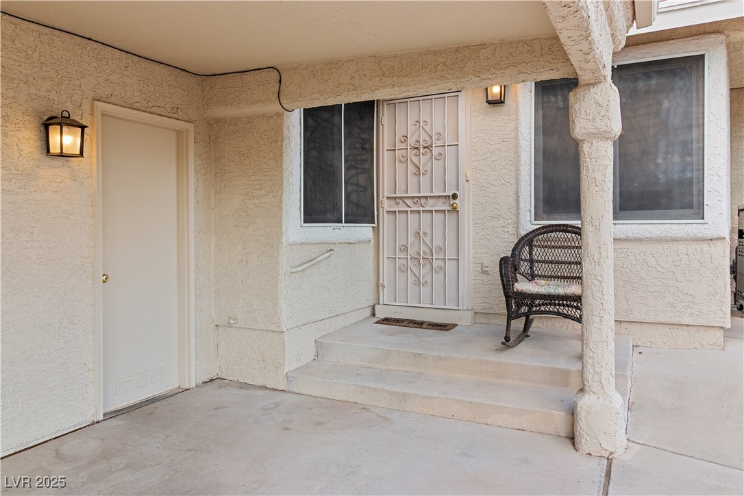 2297 Camel Mesa Drive Laughlin, NV 89029 - Photo 55 of 98 Alternate Doorway entry to property's Breakfast Area / Kitchen featuring stucco siding