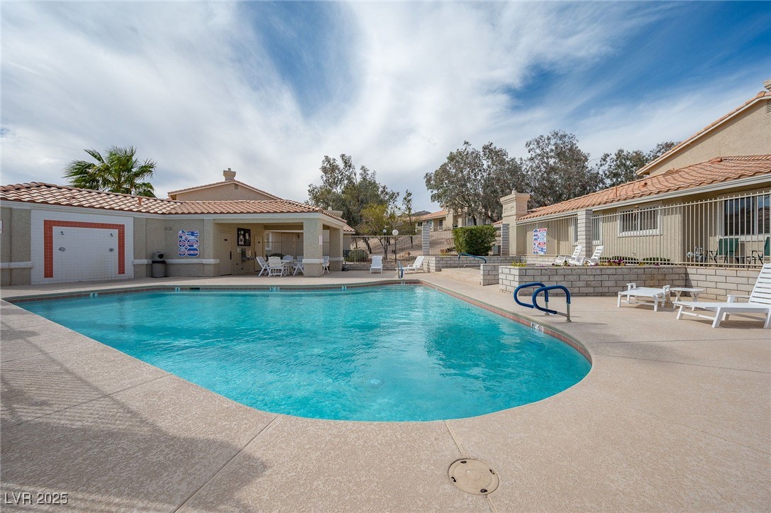 2297 Camel Mesa Drive Laughlin, NV 89029 - Photo 93 of 98 Community pool featuring a patio and a residential view