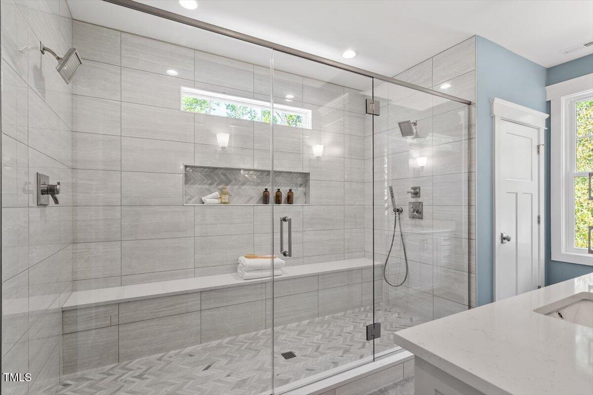 3932 Old Chapel Hill Road Durham, NC 27707 - Photo 26 of 46 a bathroom with a shower and a sink