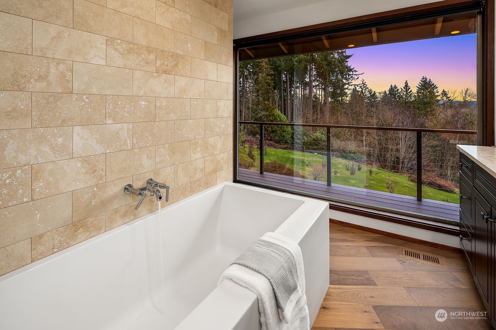 14050 184th Avenue Northeast Woodinville, WA 98072 - Photo 14 of 38 a bathroom with a bathtub and window