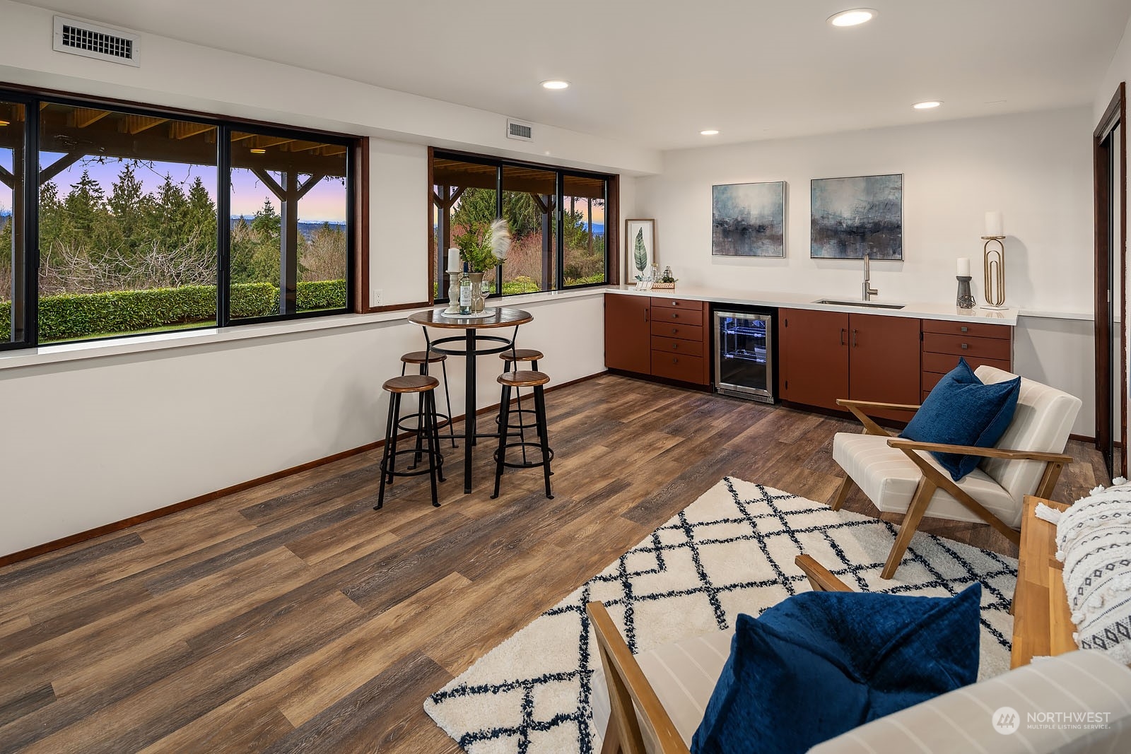 14050 184th Avenue Northeast Woodinville, WA 98072 - Photo 17 of 38 a living room with furniture and a large window
