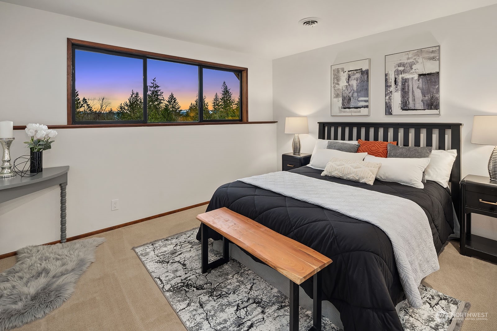 14050 184th Avenue Northeast Woodinville, WA 98072 - Photo 19 of 38 a bedroom with a bed and wooden floor