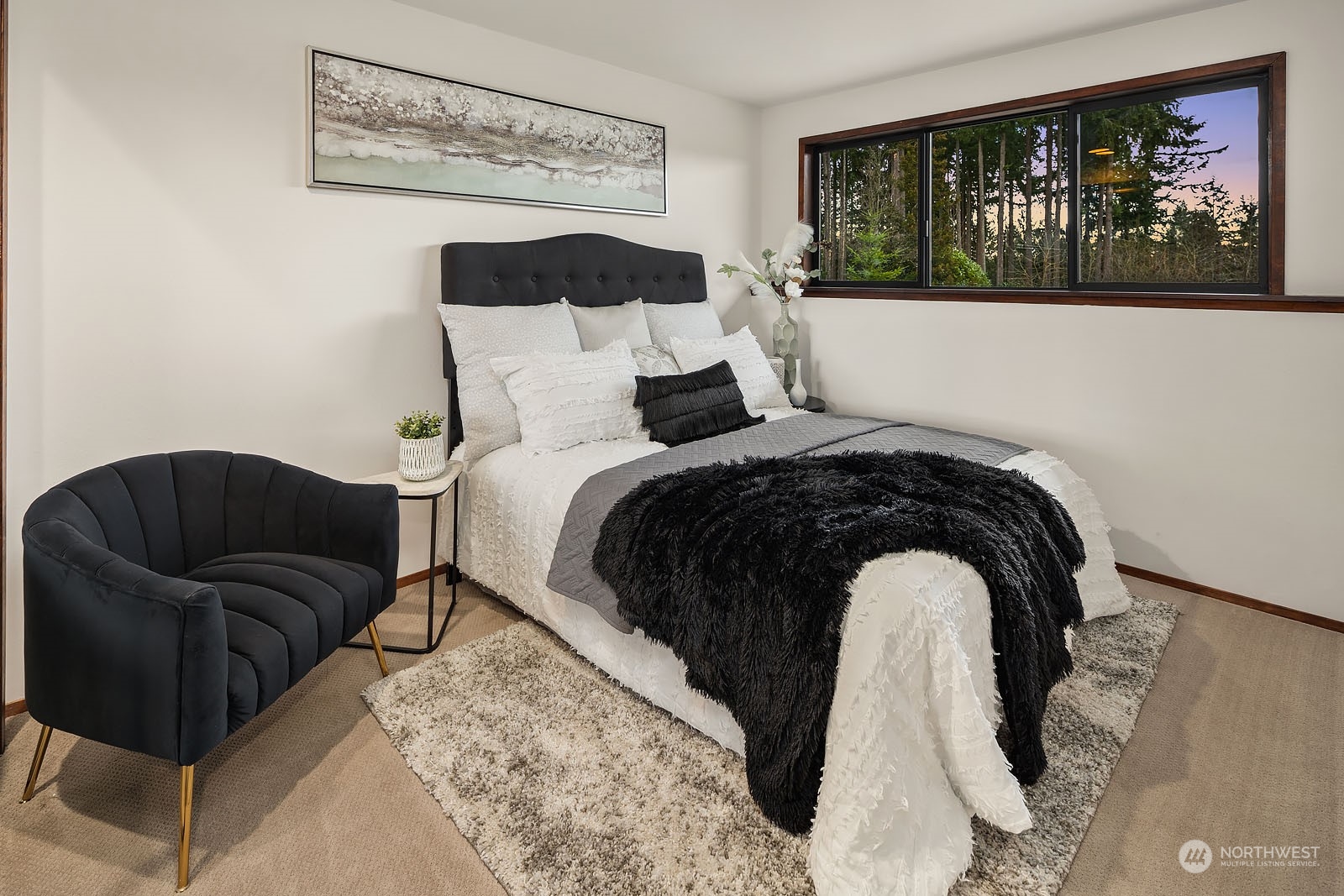 14050 184th Avenue Northeast Woodinville, WA 98072 - Photo 20 of 38 a bedroom with a bed and cupboard