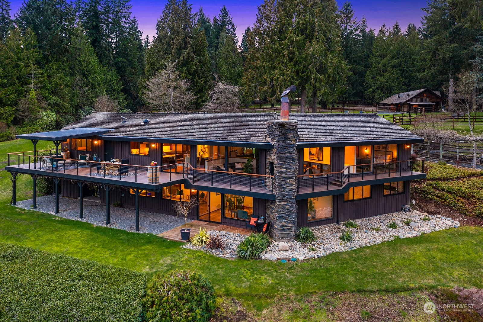 14050 184th Avenue Northeast Woodinville, WA 98072 - Photo 2 of 38 an aerial view of a house with swimming pool and deck