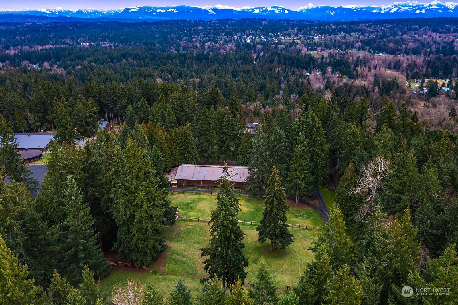 14050 184th Avenue Northeast Woodinville, WA 98072 - Photo 24 of 38 a view of a city with a lake view