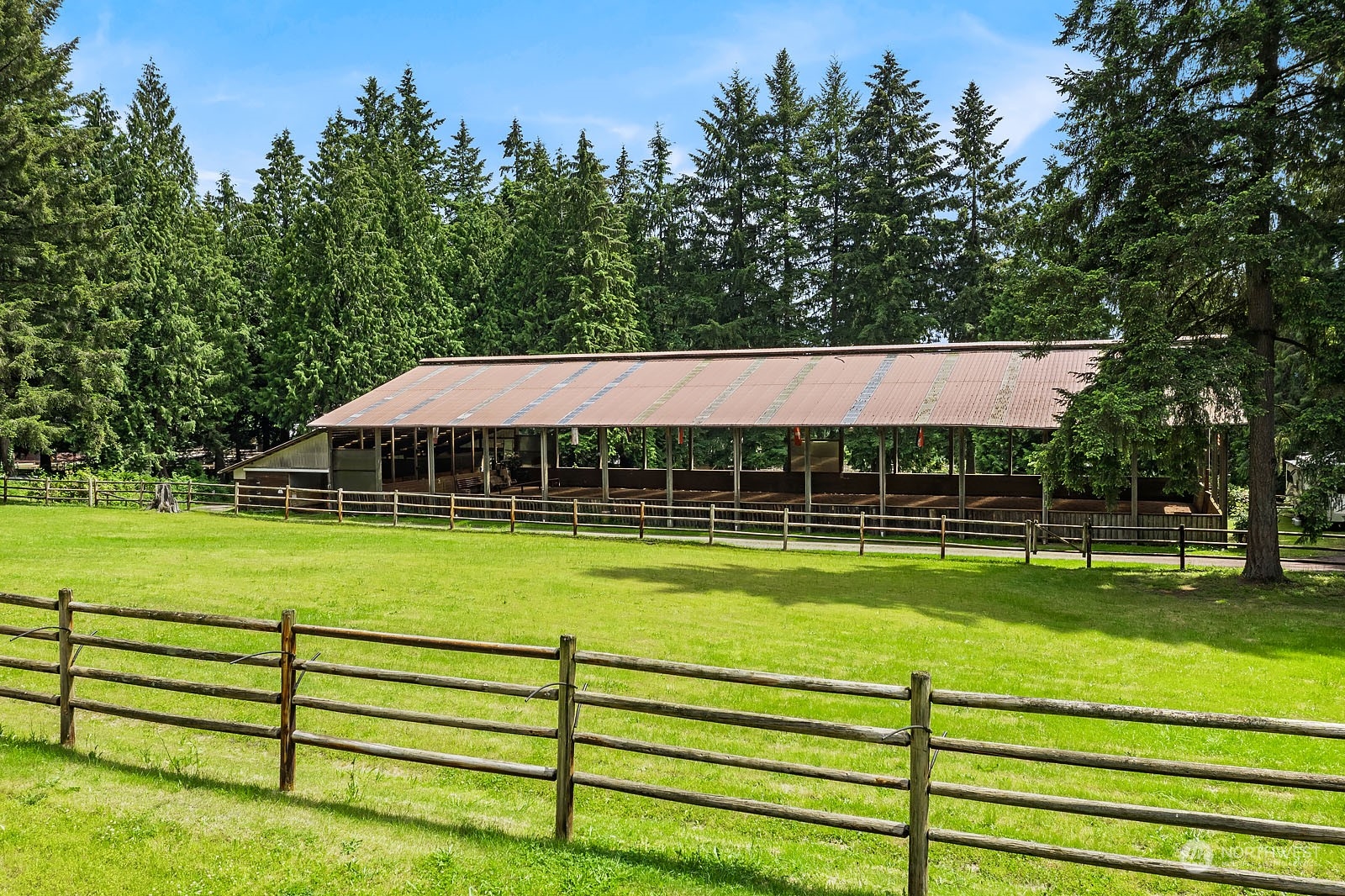14050 184th Avenue Northeast Woodinville, WA 98072 - Photo 33 of 38 a view of a house with a yard