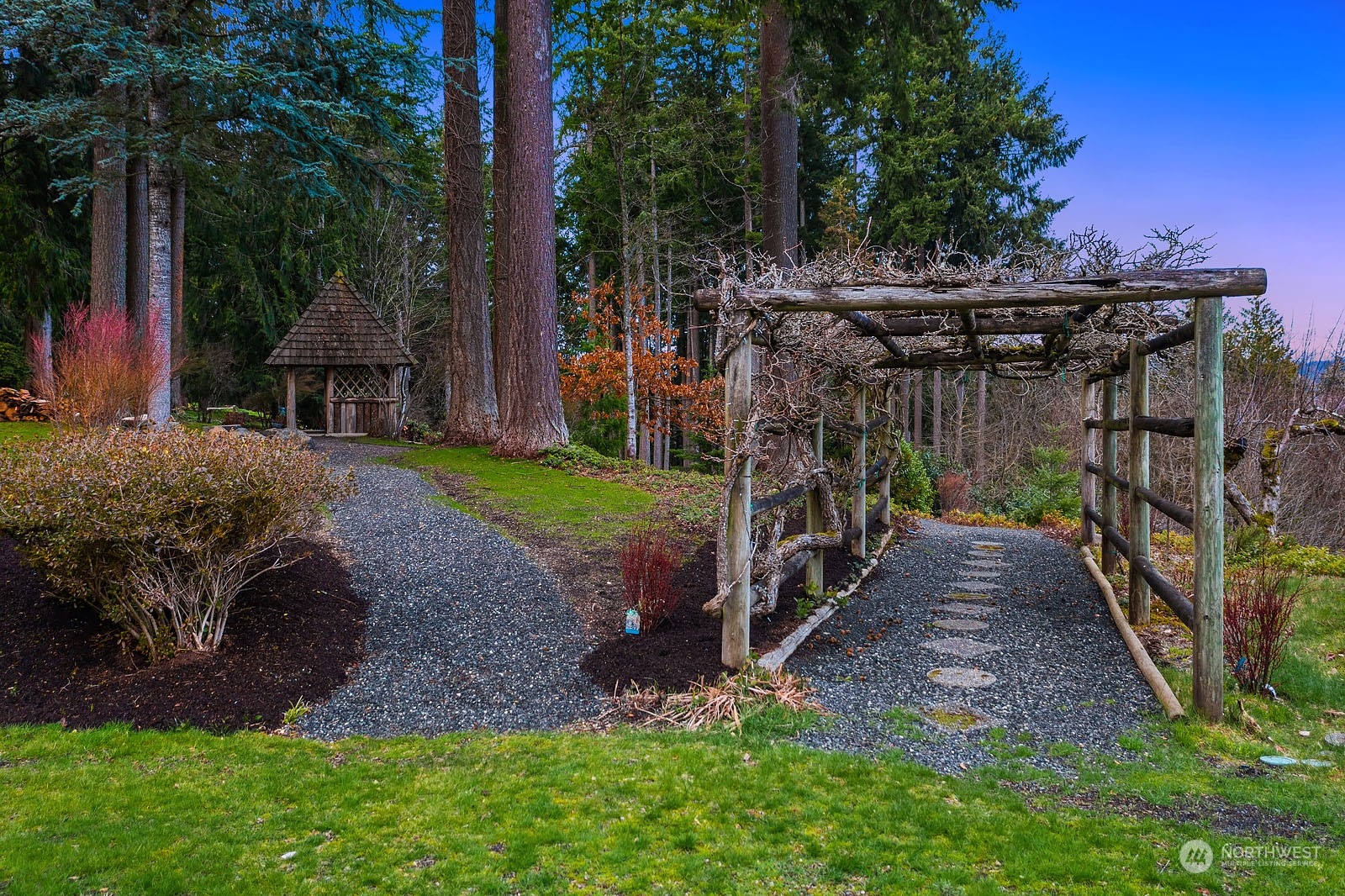 14050 184th Avenue Northeast Woodinville, WA 98072 - Photo 37 of 38 a view of a house with a yard and wooden fence
