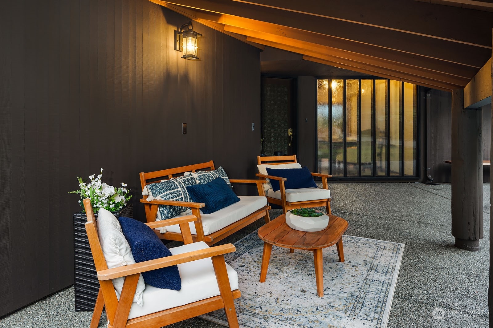 14050 184th Avenue Northeast Woodinville, WA 98072 - Photo 4 of 38 a wooden bench sitting in front of a building