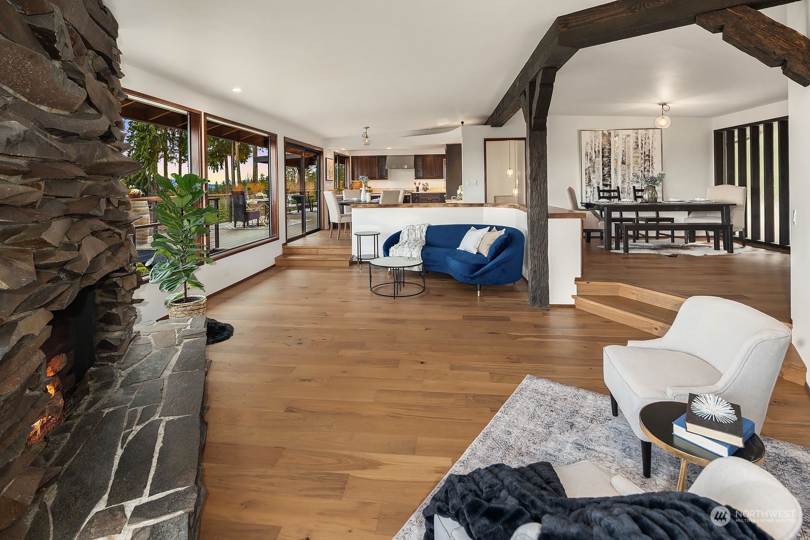 14050 184th Avenue Northeast Woodinville, WA 98072 - Photo 6 of 38 a living room with furniture and a table