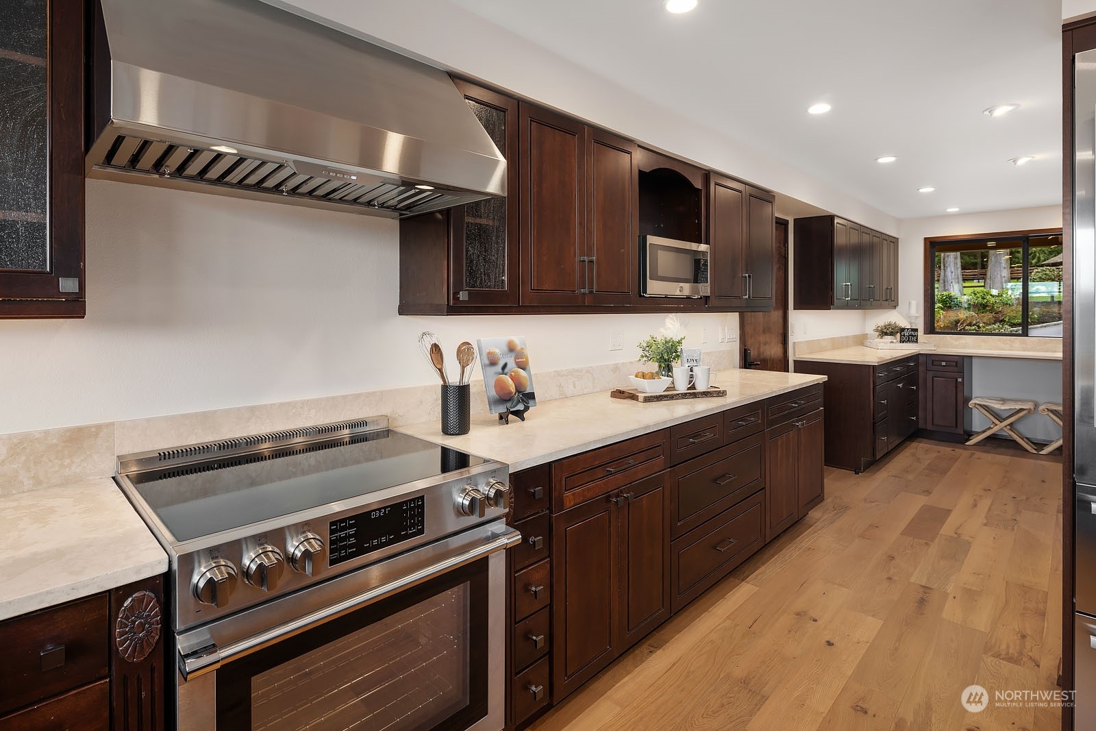 14050 184th Avenue Northeast Woodinville, WA 98072 - Photo 9 of 38 a kitchen with a stove and a sink