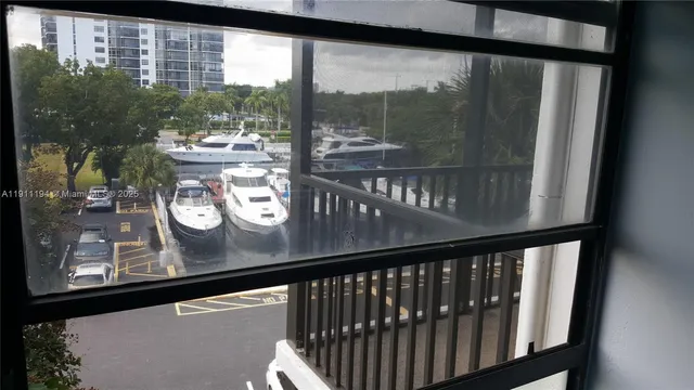 a view of a glass door with a balcony