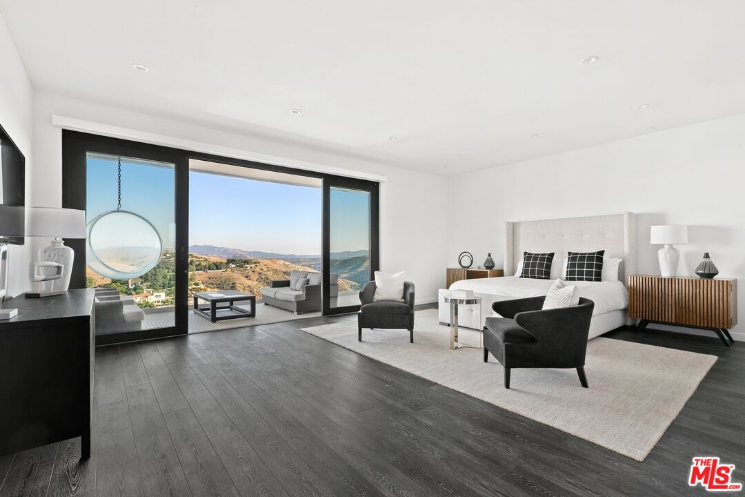 167 Saddlebow Road Bell Canyon, CA 91307 - Photo 15 of 33 a living room with furniture and a large window
