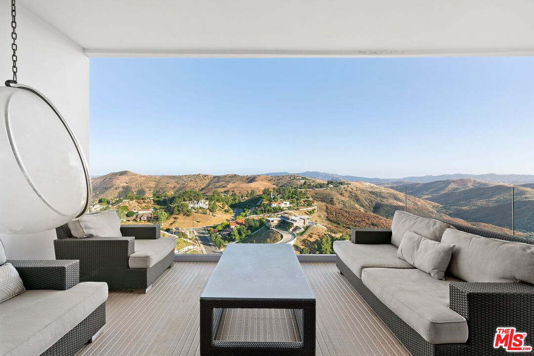 167 Saddlebow Road Bell Canyon, CA 91307 - Photo 16 of 33 wooden floor with a couch