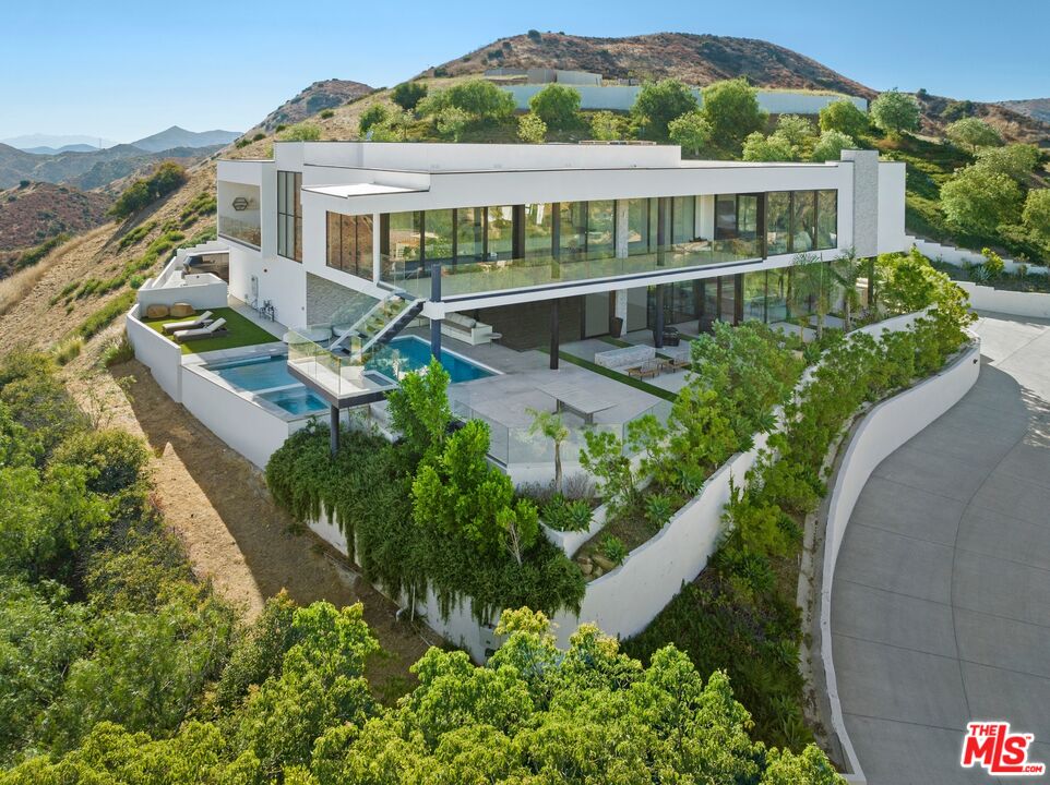 167 Saddlebow Road Bell Canyon, CA 91307 - Photo 28 of 33 an aerial view of a house with a garden